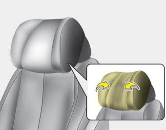 Kia Carnival: Headrest (for rear seat). For rear outboard passenger's comfort, the ends of the headrest can be adjusted