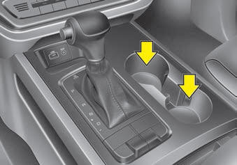 Kia Carnival: Cup holder. Front Type B