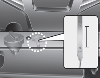 Kia Carnival: Checking the engine oil level. 1. Be sure the vehicle is on level ground.